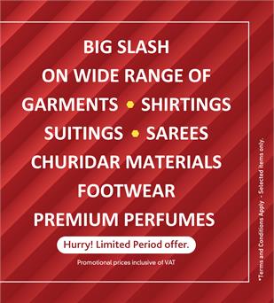 K.M. Trading Big Slash sale banner for garments, shirtings, suitings, sarees, churidar materials, footwear, and premium perfumes.